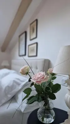 a bedroom with a bed and a view of a balcony at Situation exceptionnelle HARMONY III in Carcassonne