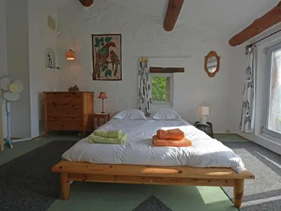 a bedroom with a bed with towels on it at Villa in Pyrenees with Stunning Mountain Views in Fenouillet