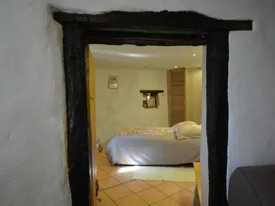 a bedroom with a bed in a room at Villa in Pyrenees with Stunning Mountain Views in Fenouillet