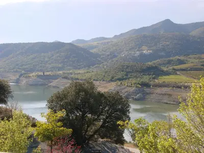 a view of a river with mountains in the background at Villa in Pyrenees with Stunning Mountain Views in Fenouillet
