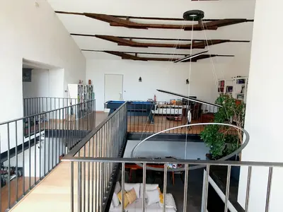 a room with a table and a ceiling at La ferme - Domaine Monbel in Mirepoix