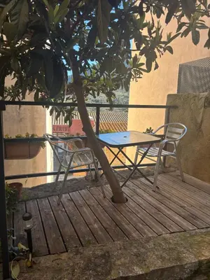a bathroom with a walk in shower and a bedroom at Chambre Le 40 marches in Cucugnan