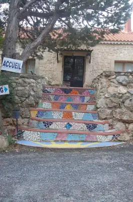 a set of steps in front of a stone building at Domaine de La Pierre Chaude in Portel-des-Corbières