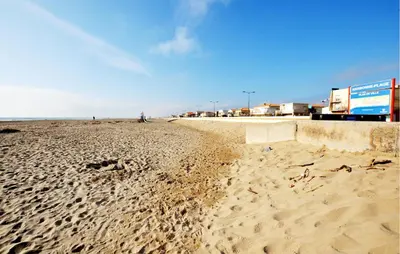 a sandy beach with footprints in the sand at Nice Home In Bizanet With Kitchen in Bizanet