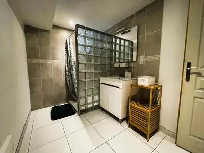 a small kitchen with a sink and a counter at Appartement 1 chambre in Peyriac-de-Mer