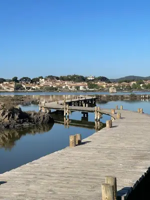a dock on a body of water at Appartement 1 chambre in Peyriac-de-Mer