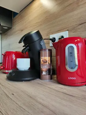 a coffee maker and a blender on a counter at Will's Appart in Narbonne