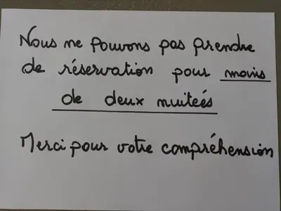 a handwritten handwriting on a piece of paper at Grand studio au milieu des vignes in Moussan
