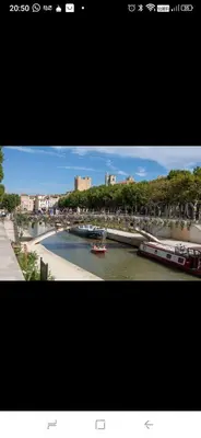 two pictures of a river with a boat in it at Studio Cosy Climatisé Centre Ville faites tout à Pied in Narbonne