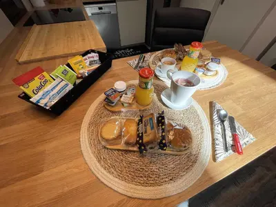 a table with a plate of food on it at La detente in Lézignan-Corbières