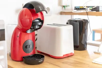 a red mixer sitting on a counter next to a toaster at Hypercentre - Proche Parking Gratuit - Fibre - Calme in Narbonne
