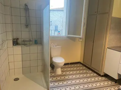 a small bathroom with a toilet and a window at Evasion en Occitanie in Mailhac