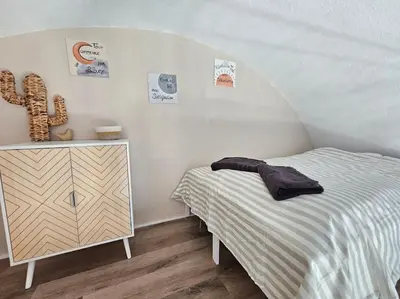a kitchen with a white refrigerator and a sink at Joli & Cosy ! 4 Personnes in Gruissan