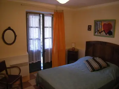a bedroom with a bed and a window at 