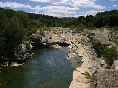 a group of people swimming in a river at 
