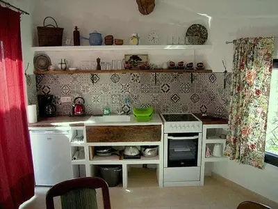 a small kitchen with a stove and a counter top at Maison Marianne Comfortable holiday residence in Ferrals-lès-Corbières
