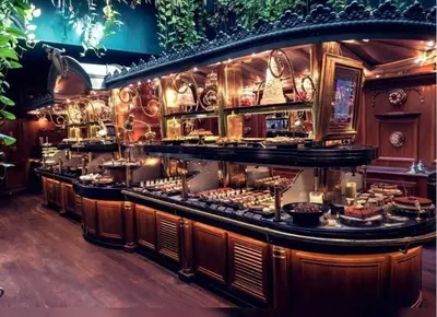 a bar with a buffet of food in a restaurant at T2 Ed Warner in Narbonne