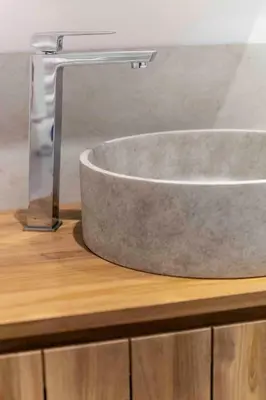 a sink on top of a counter in a bathroom at Thomas Price Appart in Narbonne