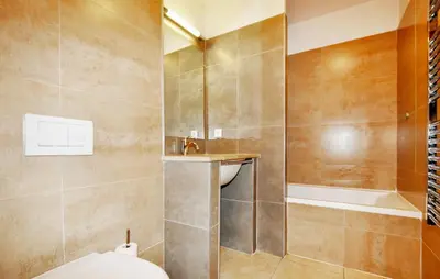 a bathroom with a shower and a toilet and a sink at 2 Bedroom Awesome Home In Saint-Laurent-De-La-Ca in Saint-Laurent-de-la-Cabrerisse
