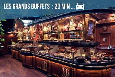 a restaurant with a counter with food on it at - L'Horizon Bleu - Cocon romantique avec vue mer panoramique in Gruissan