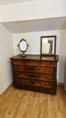 a mirror on top of a dresser in a room at Domaine 15 pers, Piscine, Pétanque, Canal du midi in Carcassonne