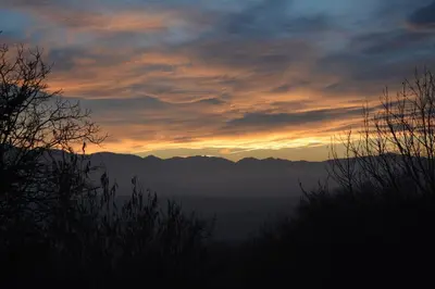 a sunset in the mountains with the sky at Cozy Tiny House plus SPA - à Pereille d'en Haut in Péreille