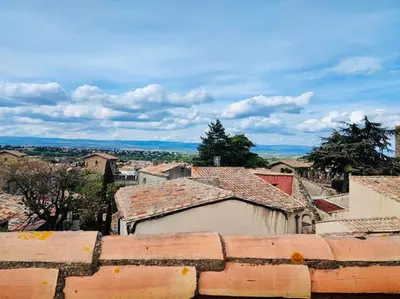 a view from the roof of a town with buildings at Le Rendez Vous - 4 étoiles - parking gratuit in Carcassonne