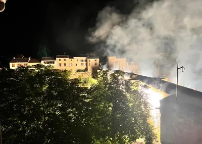 a building on a hill with smoke coming out of it at Good vibes in Limoux