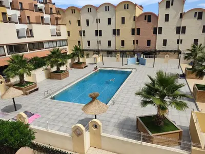 an overhead view of a swimming pool in a building at Gruissan: T2 Cabine, Piscine, Parking, Centre, 4/5 pers, Petit Budget - FR-1-796-3 in Gruissan