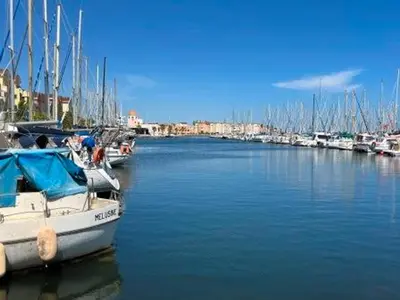 a group of boats are docked in a harbor at Gruissan - T2 Mezzanine Climatisé Proche Plage - 5/6 Pers - Parking Privé - Tout Équipé - FR-1-796-23 in Gruissan