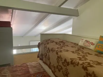 a bedroom with a bed in a room at Villa 6/7 pers climatisée - Proche port et village - Parking privé - FR-1-796-36 in Gruissan