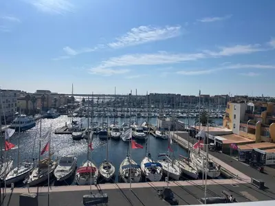 a bunch of boats are docked in a harbor at Studio Familial Piscine, Parking, Proche Plage - Idéal 4 pers, Budget Serré, Gruissan - FR-1-796-58 in Gruissan