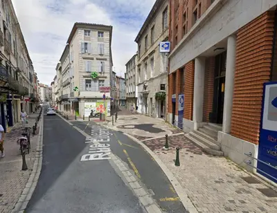 an empty street in a city with buildings at Le Sunny - Cocon Lumineux au Cœur de Castres in Castres