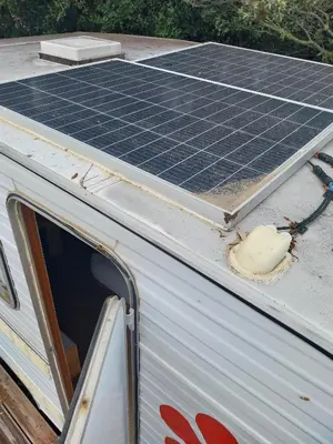 a van with solar panels on top of it at La Caravane d'Alon in Magrie