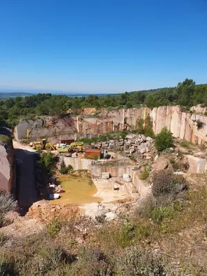 a view of a rock quarry with water in it at Maison de charme in Caunes-Minervois