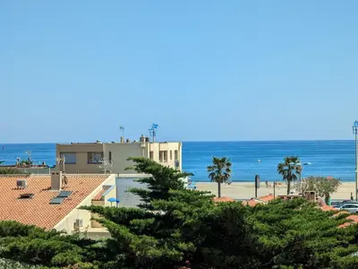 a view of the beach and the ocean at Charmant T2 traversant, plage à 100m, balcon, bien équipé, idéal 4 personnes - FR-1-797-3 in Port-la-Nouvelle