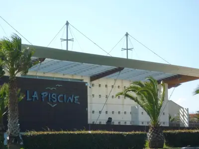 a view of the fnbihadihad stadium at T3 Climatisé RDC avec Terrasse, Parking, Proche Activités - Port-la-Nouvelle - FR-1-797-30 in Port-la-Nouvelle