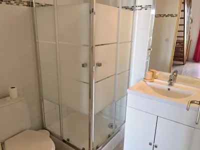 a bathroom with a shower and a sink at Charmante Maison T2 Mezzanine avec Jardin et Parking, à 500m de la Plage - 6 Pers. - FR-1-797-46 in Port-la-Nouvelle