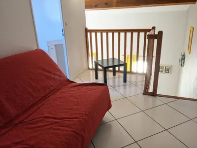 a bedroom with a bed and a picture on the wall at Superbe villa T4 confort avec cour, proche plage - 6 Pers. Parking - FR-1-797-47 in Port-la-Nouvelle