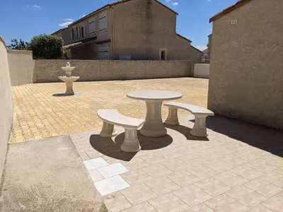 a bedroom with two beds and a window at Superbe villa T4 confort avec cour, proche plage - 6 Pers. Parking - FR-1-797-47 in Port-la-Nouvelle