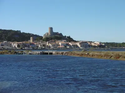 a view of a river with a town in the background at Appartement T2 à Gruissan, RDC, Plage à 150m, Parking, 4-5 pers - FR-1-796-72 in Gruissan