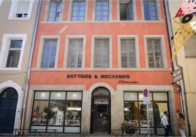 a store front of a building on a city street at SUNNY , terrasse, climatisation, centre ville in Carcassonne