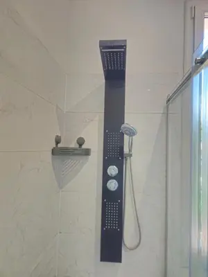 a shower with a blow dryer in a bathroom at AV de Bordeaux in Narbonne