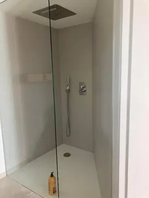 a shower with a glass door in a bathroom at Maison exceptionnelle piscine in Aussillon