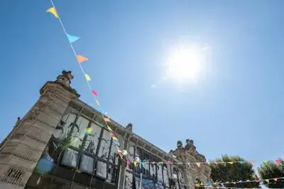 a kite flying in the sky above a building at Le clos des jacobins in Narbonne