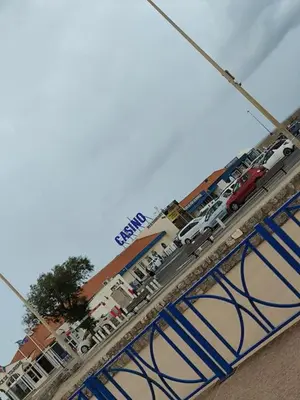 a bridge with cars parked on top of it at Les flamants roses in Port-la-Nouvelle