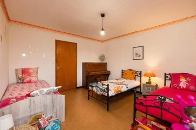 a bathroom with a tub and a toilet and a sink at L'Oustal 3 chambres avec grand jardin parking gratuit in Bram