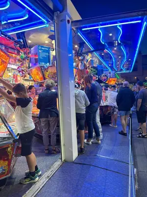 a group of people standing in a food store at T2 moderne à 2 min de la plage in Port-la-Nouvelle