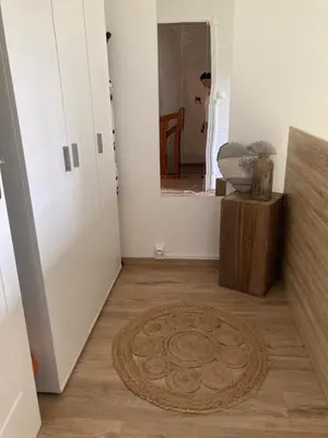 a hallway with a room with a rug on the floor at Maison 2 chambres avec cour intérieure in Alet-les-Bains