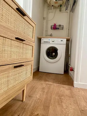 a laundry room with a washer and dryer in it at Chez Isa et Thomas in Narbonne